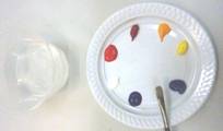 plastic plate with warm and cool primary colours